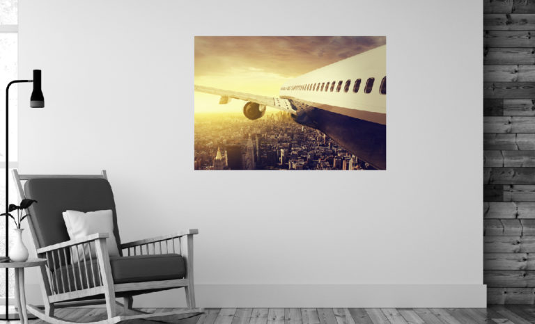 Samolot nad miastem fotoobraz